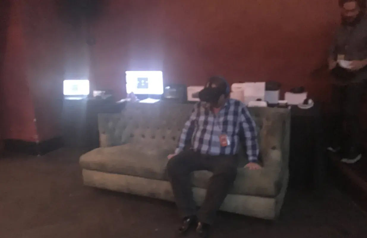 Attendee seated inside the Avalon Theatre during the Together Festival